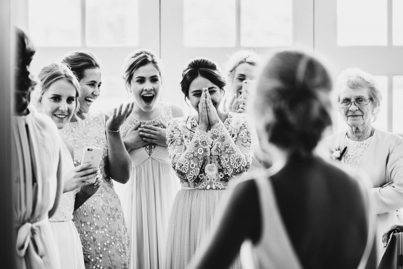 bridesmaids' reaction by Mark Wallis